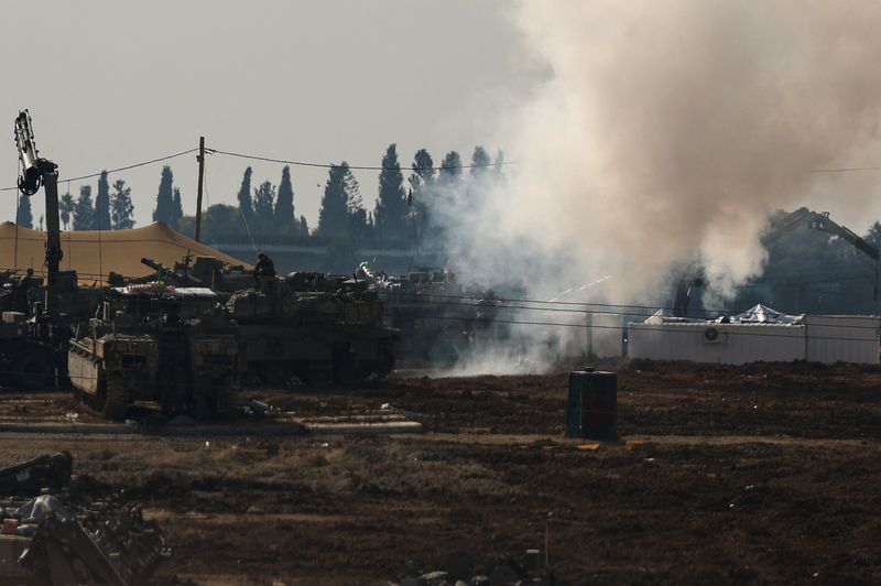 &copy; Reuters. An Israeli soldier sits on top of a tank at a camp, amid the ongoing conflict between Israel and Hamas, near the Israel-Gaza border, in Israel, January 12, 2025. REUTERS/Kai Pfaffenbach