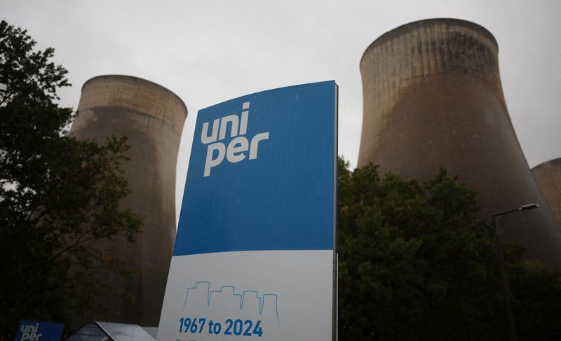 &copy; Reuters. FILE PHOTO: Signage is seen in front of the cooling towers at Uniper's Ratcliffe-on-Soar power station the day after it was taken offline, in Ratcliffe-on-Soar, Britain, October 1, 2024. REUTERS/Phil Noble/File Photo