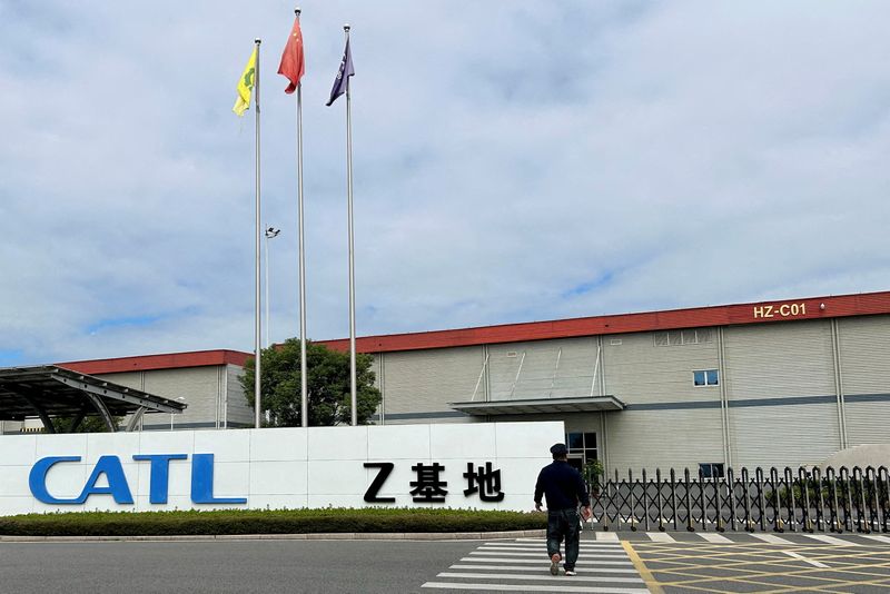 &copy; Reuters. FILE PHOTO: A man walks outside CATL's battery cell production facility code-named "Z-base" in Ningde, Fujian province, China November 8, 2024. REUTERS/Kevin Krolicki//File Photo