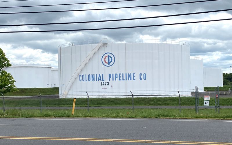 &copy; Reuters. FILE PHOTO: Holding tanks are pictured at Colonial Pipeline's Linden Junction Tank Farm in Woodbridge, New Jersey, U.S., May 10, 2021. REUTERS/Hussein Waaile/File Photo