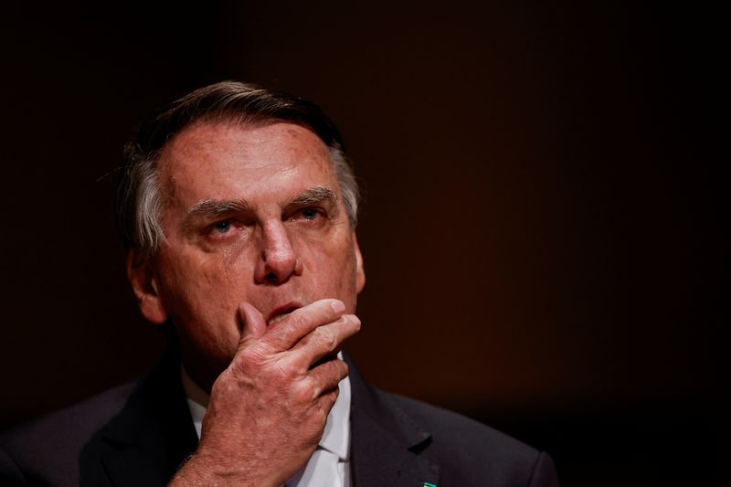 &copy; Reuters. FILEE PHOTO: Brazil's former President Jair Bolsonaro reacts at an event at the Municipal Theatre in Sao Paulo, Brazil March 25, 2024. REUTERS/Amanda Perobelli/File Photo