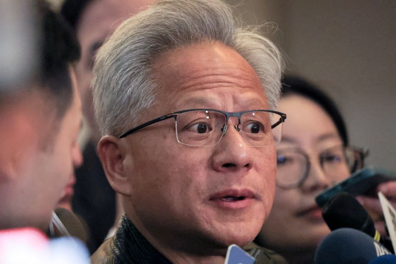 &copy; Reuters. Nvidia CEO Jensen Huang speaks to the media at Wistron's year-end party in Taipei, Taiwan January 17, 2025. REUTERS/Ann Wang