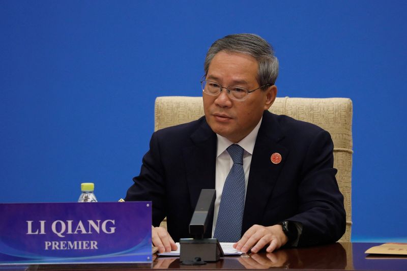 China's premier vows effective measures to address economic issues