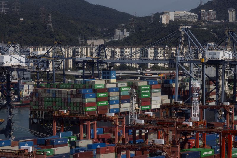 China challenges Trump tariffs at WTO, package shippers warn of chaos