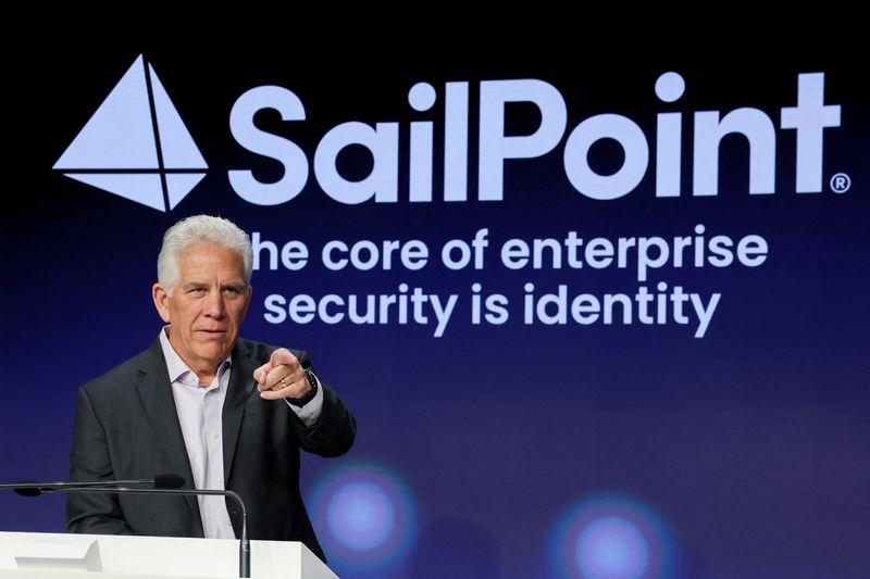 © Reuters. Mark McClain, CEO and founder of SailPoint, a cybersecurity company, gestures as he attends the company's IPO at the Nasdaq Market, in New York City, New York, U.S., February 13, 2025. REUTERS/Brendan McDermid