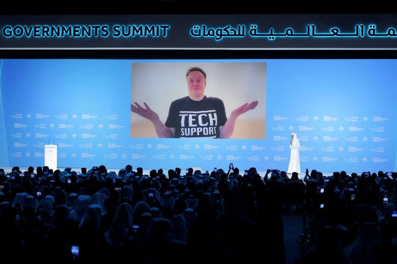 © Reuters. FILE PHOTO: Tesla and SpaceX CEO Elon Musk and UAE Minister of State for Artificial Intelligence Omar Sultan Al Olama attend a plenary session titled 'Boring cities, AI, and DOGE' at the World Governments Summit, in Dubai, United Arab Emirates, February 13, 2025. REUTERS/Amr Alfiky/File Photo