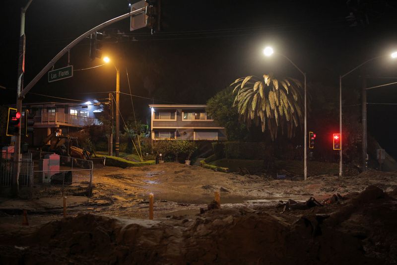 Heavy rain raises threat of more mudslides in Southern California