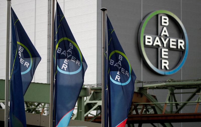 &copy; Reuters. FILE PHOTO: FILE PHOTO: Logo and flags of Bayer AG are pictured outside a plant of the German pharmaceutical and chemical maker in Wuppertal, Germany August 9, 2019. REUTERS/Wolfgang Rattay/File Photo