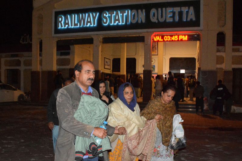 Pakistan insurgents take dozens of hostages in attack on train, police say