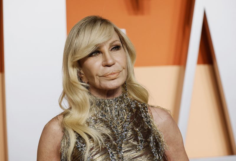 Donatella Versace steps down as design chief as Prada circles