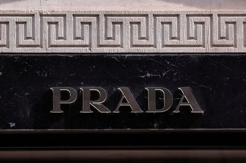 Prada's CEO flies to New York as speculation swirls over Versace bid