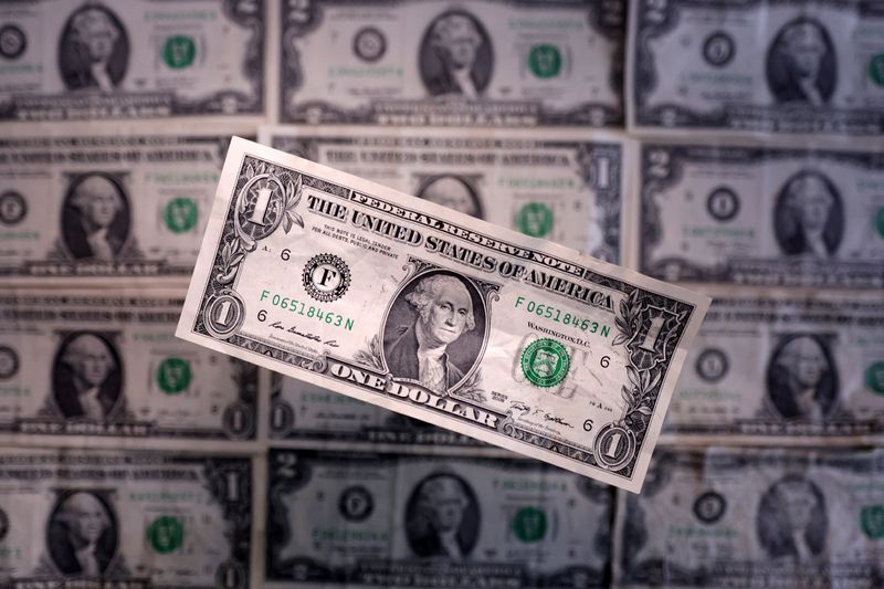 Dollar steady as Fed's rate cut view calms market nerves