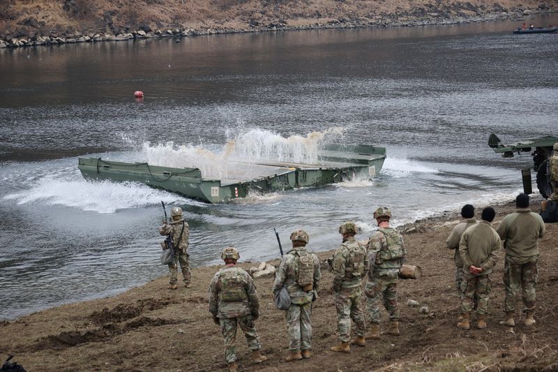 &copy; Reuters. U.S. and South Korean army soldiers take part in a U.S.-South Korea joint river-crossing exercise which is a part of the annual Freedom Shield joint military training, near the demilitarized zone separating the two Koreas in Yeoncheon, South Korea, March