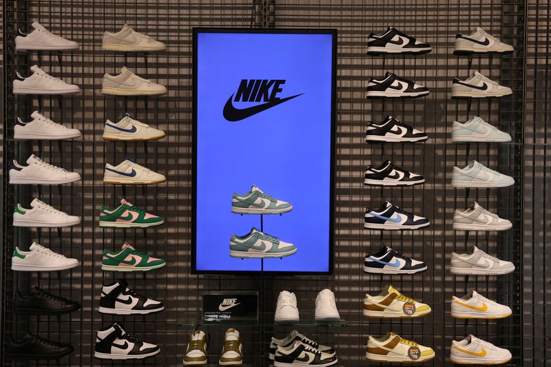 Nike posts smaller drop in quarterly revenue on holiday demand, new launches