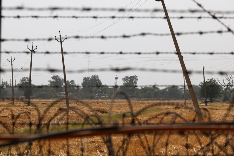 Exclusive-Pakistan defence minister says military incursion by India is imminent
