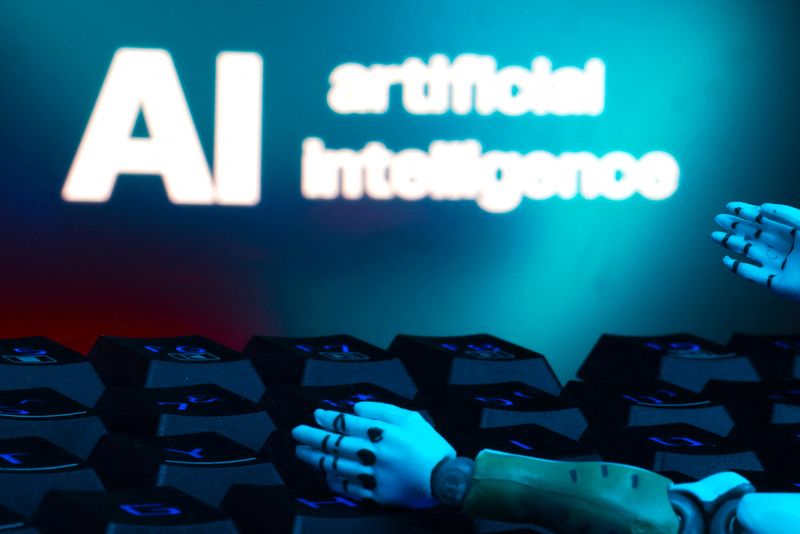 &copy; Reuters. A message reading "AI artificial intelligence", a keyboard, and robot hands are seen in this illustration taken January 27, 2025. REUTERS/Dado Ruvic/Illustration