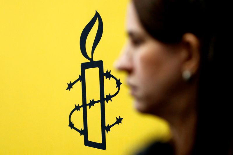 &copy; Reuters. Logo da Anistia Internacional em Caracasn 20/2/2019   REUTERS/Carlos Jass