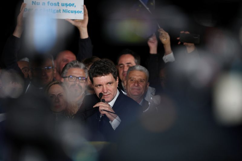 &copy; Reuters. FILE PHOTO: Presidential candidate Nicusor Dan speaks as he reacts to exit polls of Romania's second round of the presidential election, in Bucharest, Romania, May 18, 2025. REUTERS/Stoyan Nenov/File Photo