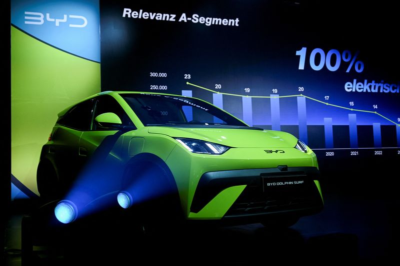 &copy; Reuters. A BYD Dolphin Surf electric vehicle is displayed on stage during a presentation by BYD carmaker in Berlin, Germany May 21, 2025. REUTERS/Annegret Hilse