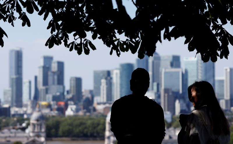 UK business downturn eases despite worsening factory woes, PMI shows