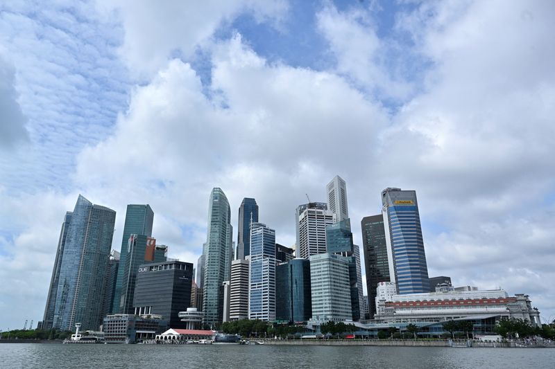 Singapore MAS survey shows economists cut GDP, inflation forecasts and see more easing