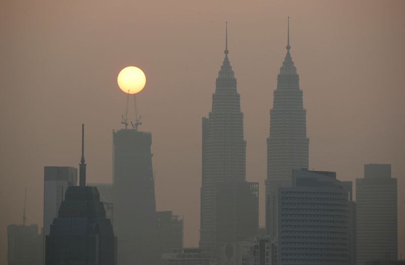 Analysis-Malaysia scores record flows as bond investors favour Asia