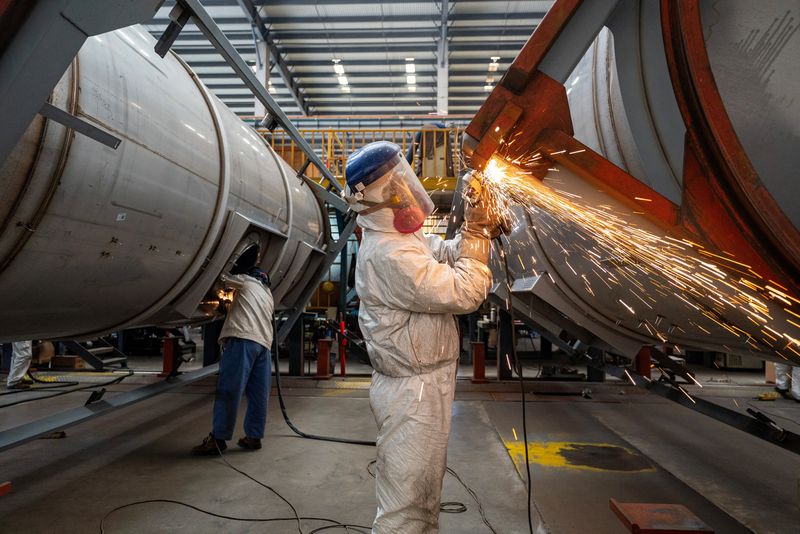 China's May industrial profits slip back into sharp decline