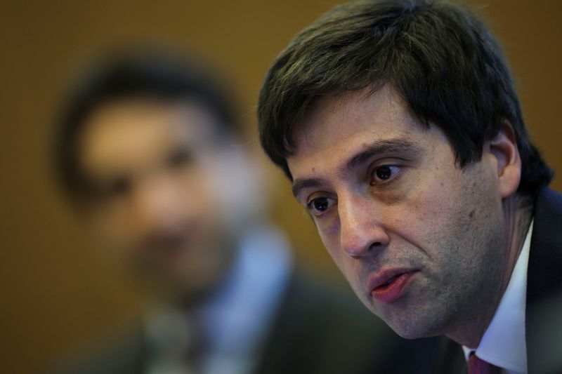 Brazil central bank sees rate cut debate as premature, says official