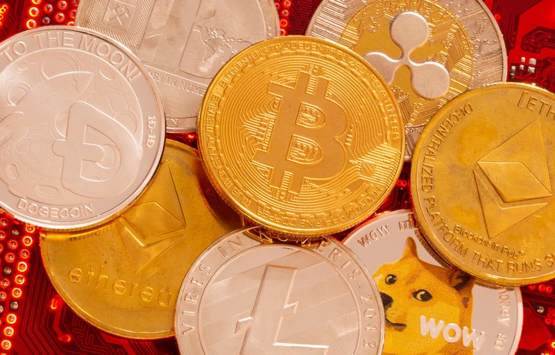 &copy; Reuters. Representações das criptomoedas Bitcoin, Ethereum, DogeCoin, Ripple e Litecoin nesta ilustração tirada em 29 de junho de 2021. REUTERS/Dado Ruvic