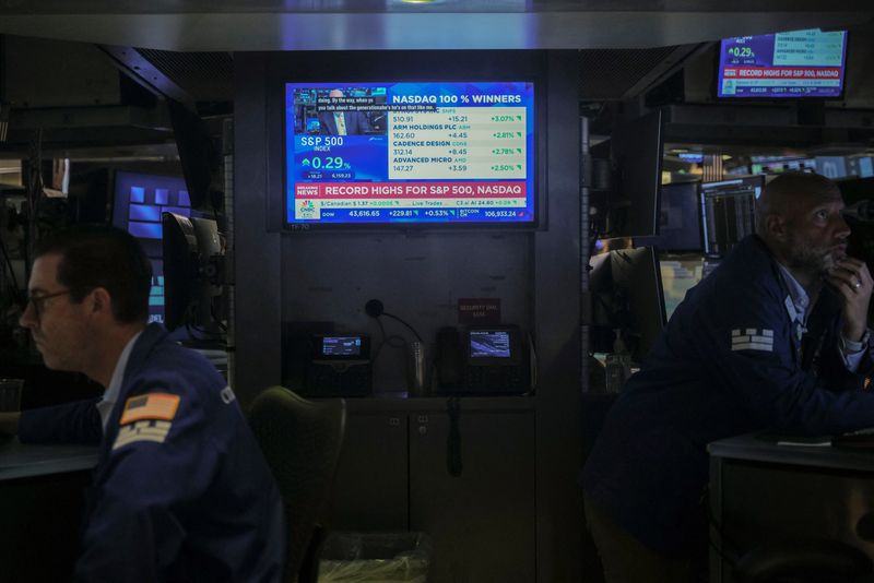 Wall Street closes at record highs after turbulent months
