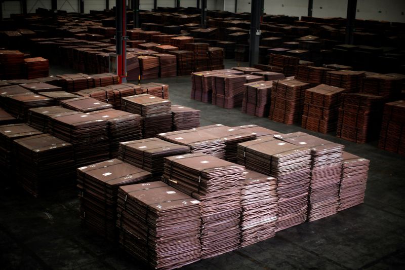 &copy; Reuters. FILE PHOTO: Copper cathodes are seen inside a warehouse near Yangshan Deep Water Port, south of Shanghai March 23, 2012. REUTERS/Carlos Barria/File Photo