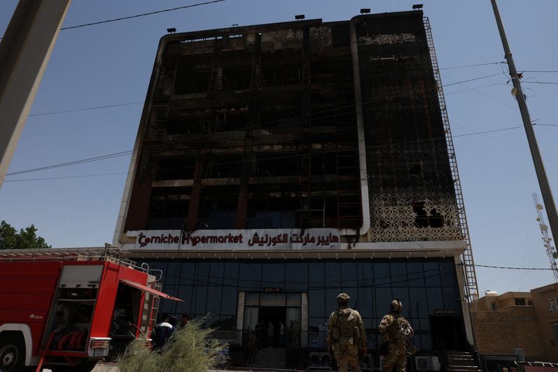 Fire at mall in Iraq leaves at least 60 dead, officials say