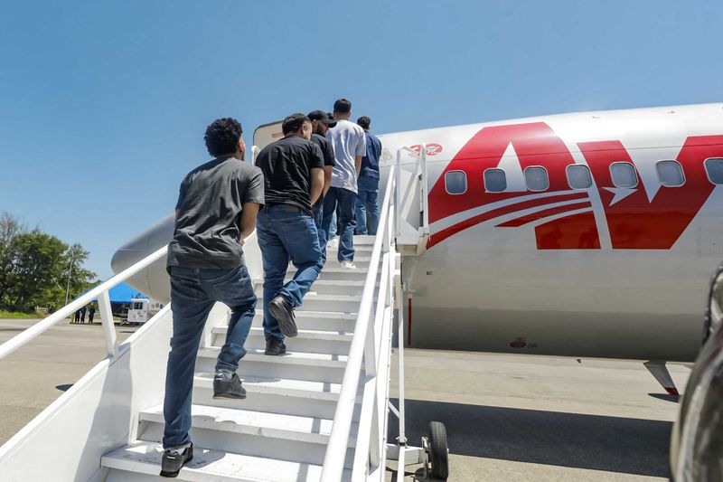 El Salvador sends detained Venezuelans home in swap for Americans