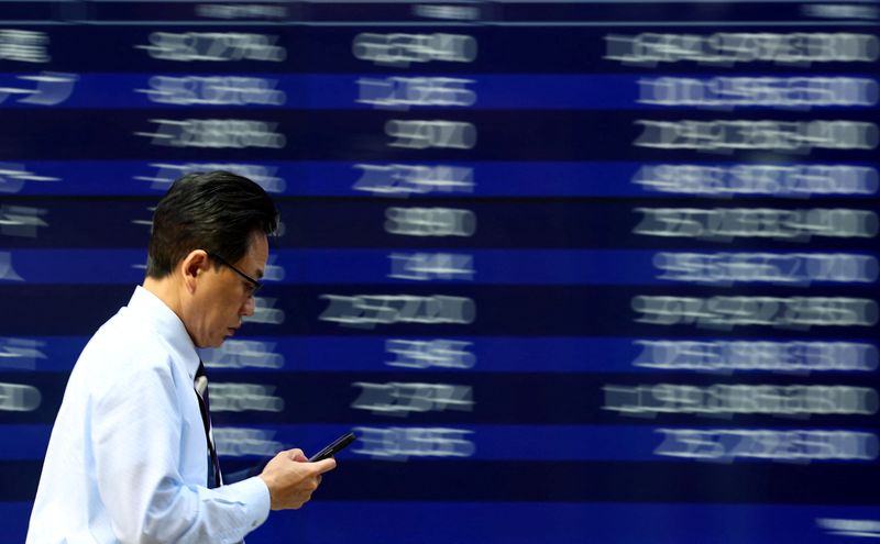 Stocks drop worldwide as investors brace for crucial week