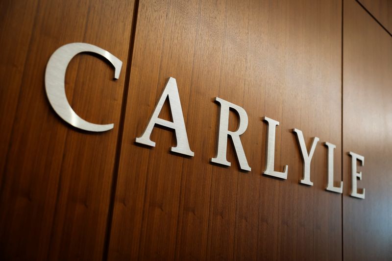 Carlyle picks three veterans for newly minted role of co-president