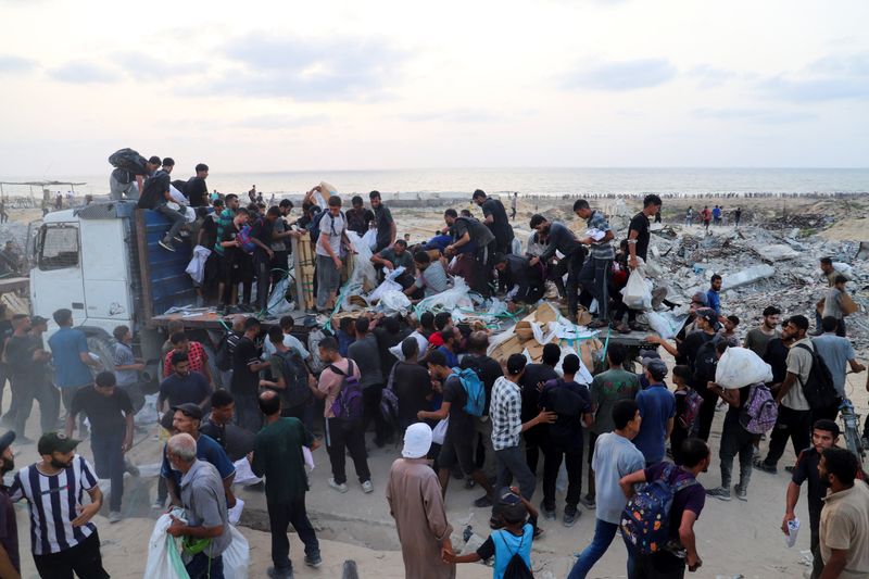 Britain warns Israel it could recognise Palestinian state as Gaza starvation spreads
