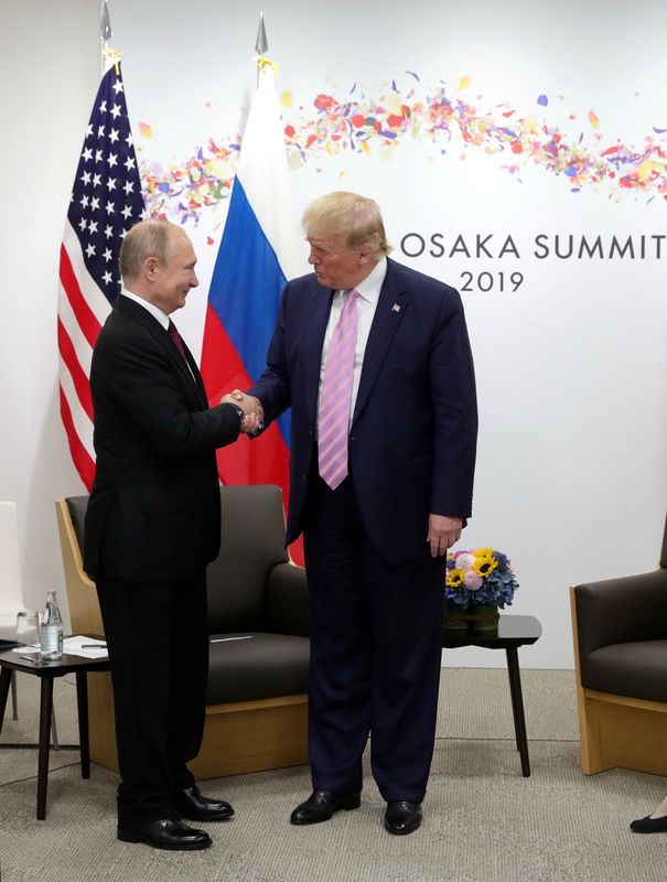 &copy; Reuters. Trump e Putin se reúnem em Osaka, Japão, em 2019n28/06/2019nSputnik/Mikhail Klimentyev/Kremlin via REUTERS