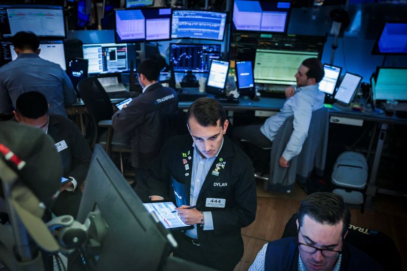 Morning Bid: Tariffs hit, Apple rises