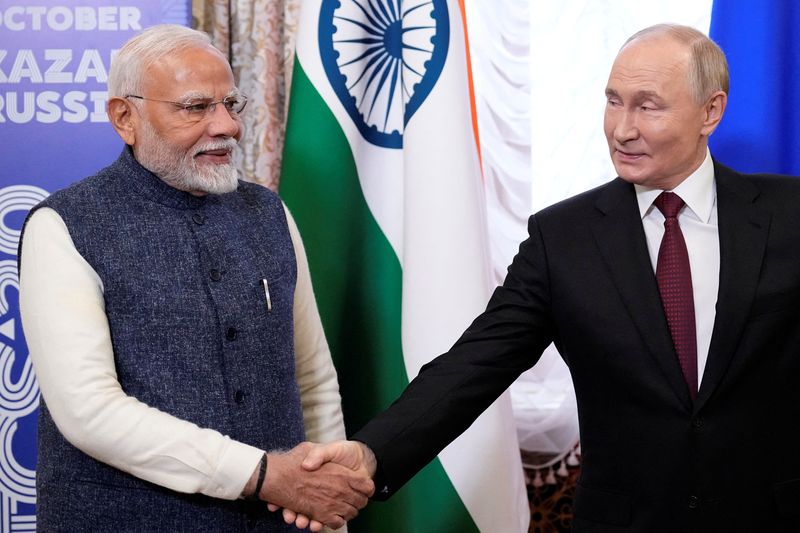 &copy; Reuters. Presidente russo Vladimir Putin e premiê indiano Narendra Modi em Kazann 22/10/2024     Alexander Zemlianichenko/Pool via REUTERS