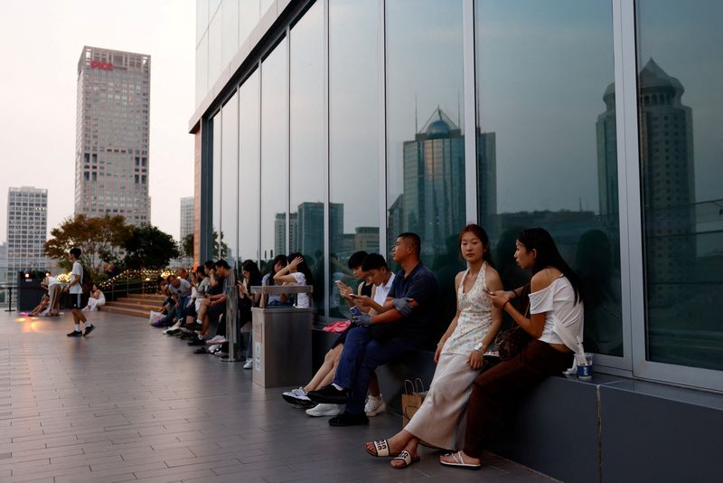 &copy; Reuters. Shopping center em Pequimn11/08/2025. REUTERS/Tingshu Wang