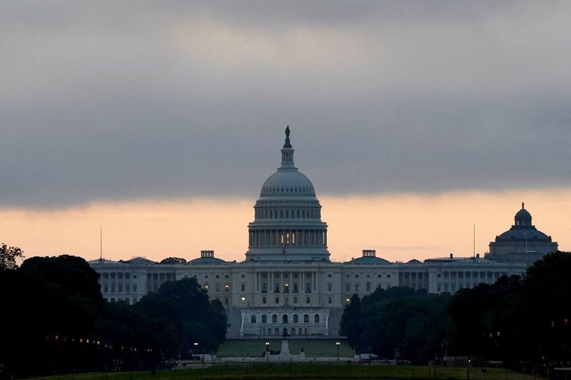 US budget deficit forecast $1 trillion higher over next decade, watchdog says