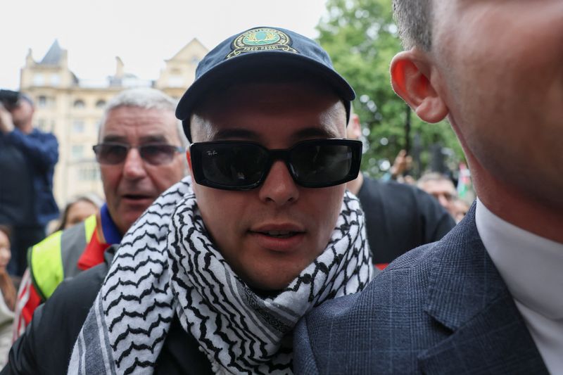 Member of Irish rap group Kneecap appears at UK court on terrorism charge