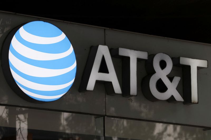 AT&T tops subscriber estimates as bundled plans, iPhone promotions lift demand
