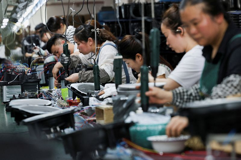 China's factory activity shrinks for seventh month in October, PMI shows