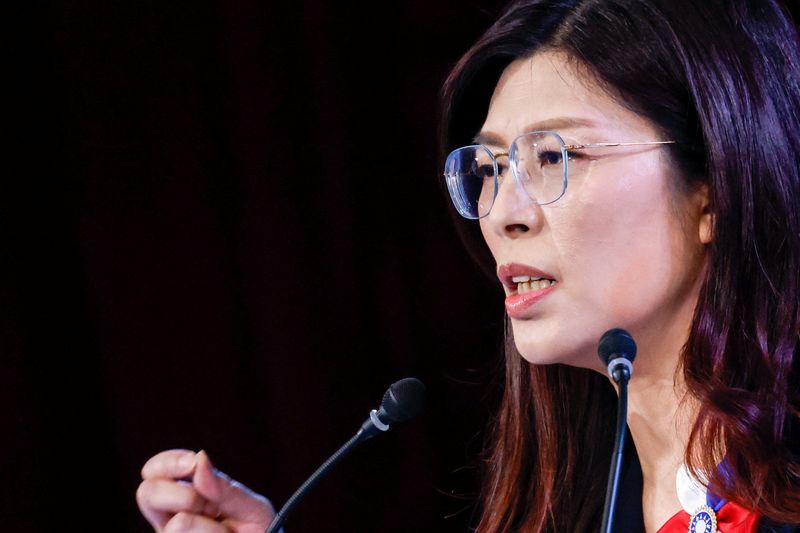 Taiwan's new opposition leader takes over, warning against risk of China war