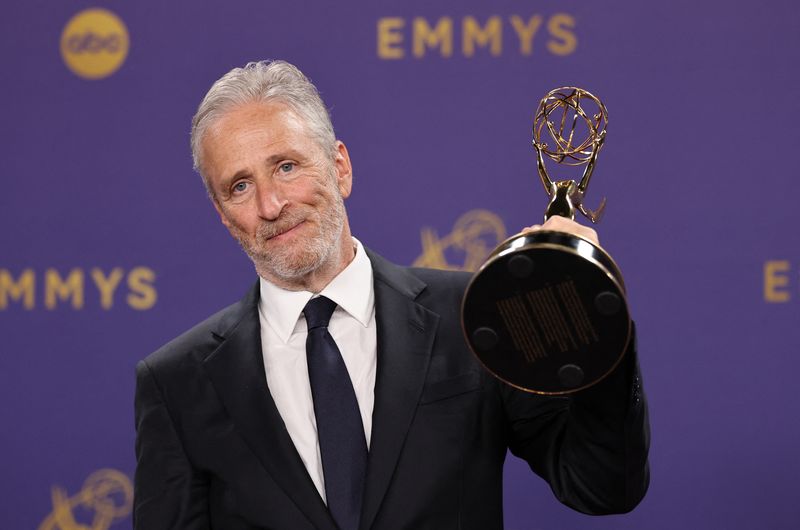 Jon Stewart will remain at the helm of ’The Daily Show’ until next December