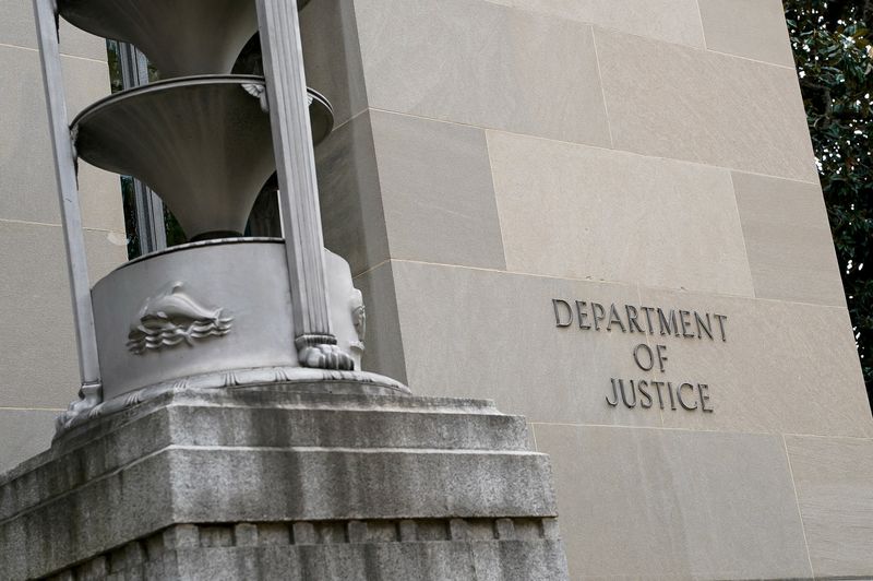 Former FBI employee sues DOJ, says unjustly fired over Pride Flag display