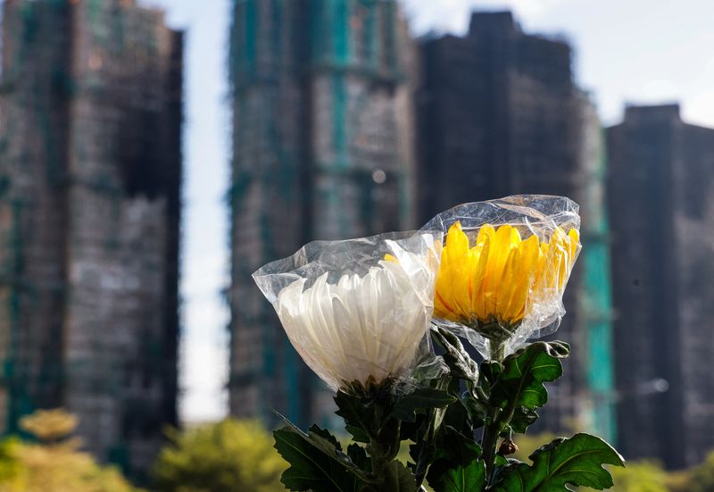 Hong Kong leader orders independent probe into fire that killed 151