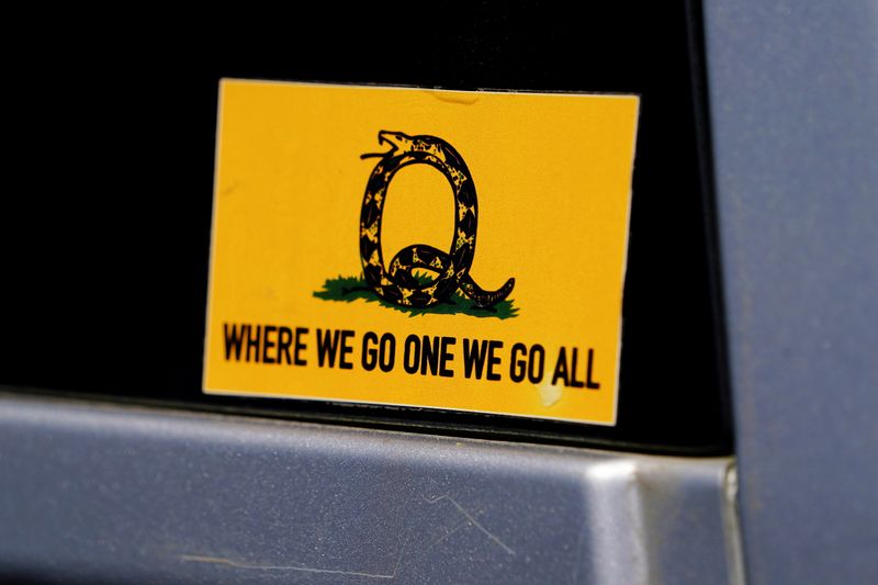 &copy; Reuters. FILE PHOTO: A sticker that references the QAnon slogan is seen on a truck that participated in a caravan convoy in Adairsville, Georgia, U.S. September 5, 2020.   REUTERS/Elijah Nouvelage/File Photo/File Photo