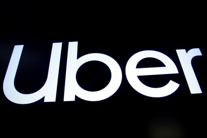 © Reuters. FILE PHOTO: A screen displays the company logo for Uber Technologies Inc. on the day of it's IPO at the New York Stock Exchange (NYSE) in New York, U.S., May 10, 2019. REUTERS/Brendan McDermid/File Photo